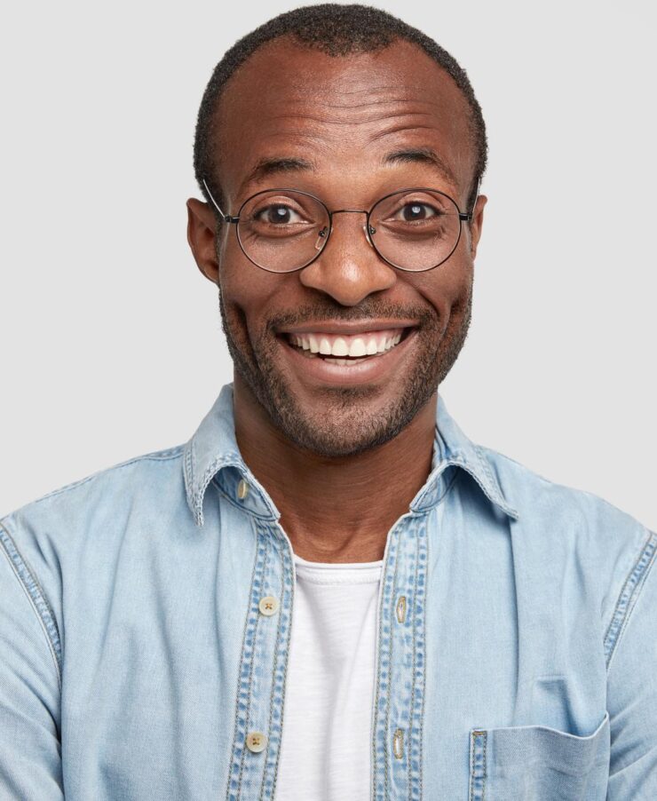 portrait-of-happy-cheerful-dark-skinned-male-laugh-P2QLH6L.jpg