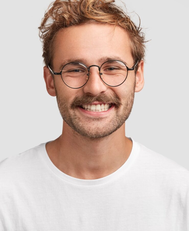young-prosperous-businessman-with-curly-hair-brigh-SPV4YT9.jpg